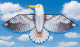 Seagull kite against a blue sky with clouds