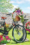 Decorative flag with a bicycle and garden scene on a white background