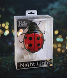 Ladybug night light in packaging with 'Regal Art & Gift' branding.