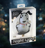 Dog-shaped night light in packaging with 'Regal' branding on a white background