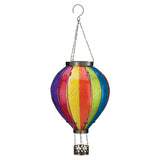 Rainbow XLG Hot Air Balloon Solar Lantern hanging with vivid multi-colored design for outdoor decor.