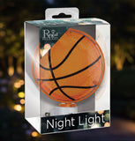 Basketball-shaped night light in packaging with 'Regal' branding
