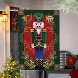 Joyful Traditions Reversible Burlap House Flag featuring a Nutcracker design with festive decorations for seasonal charm.