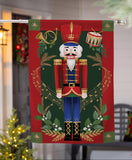 Joyful Traditions Reversible Burlap House Flag featuring a festive Nutcracker design in vibrant colors.