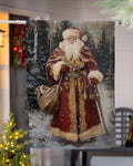 Decorative banner with a detailed illustration of Santa Claus in a snowy landscape, hanging outdoors.