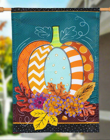 Decorative flag with a colorful pumpkin design on a teal background