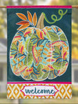 Decorative flag with a colorful pumpkin design and 'welcome' text on a teal background.