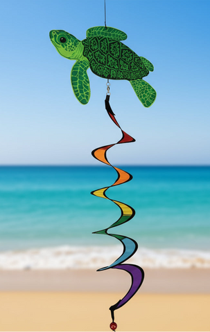 Decorative wind spinner with a green turtle design on a white background