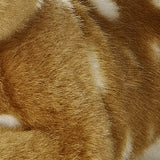 Close-up image of a Lying Fawn Plush showing its soft fur and adorable spotted patterns.