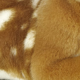 Close-up of the soft fur on the Lying Fawn Plush, showcasing its realistic and adorable features.