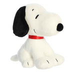 Sitting Snoopy Plush featuring a cute, soft design with a red collar and a huggable form from the Peanuts Collection.
