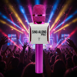Pink and white Sing-Along Pro microphone on a white background