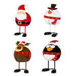 Wobbling Christmas Characters Table Decor featuring Santa Claus, Snowman, Reindeer, and Penguin for festive holiday decoration.