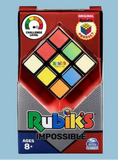 Rubik's Impossible puzzle packaging with colorful cube design on a white background
