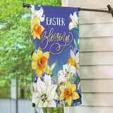 Decorative Easter banner with flowers hanging on a house exterior.