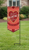 Valentine's Day garden flag with decorative border and heart design on a white background