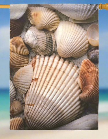 Decorative flag with a pattern of seashells on a white background