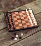 BUNKHOUSE TRAVEL CHESS & CHECKERS SE